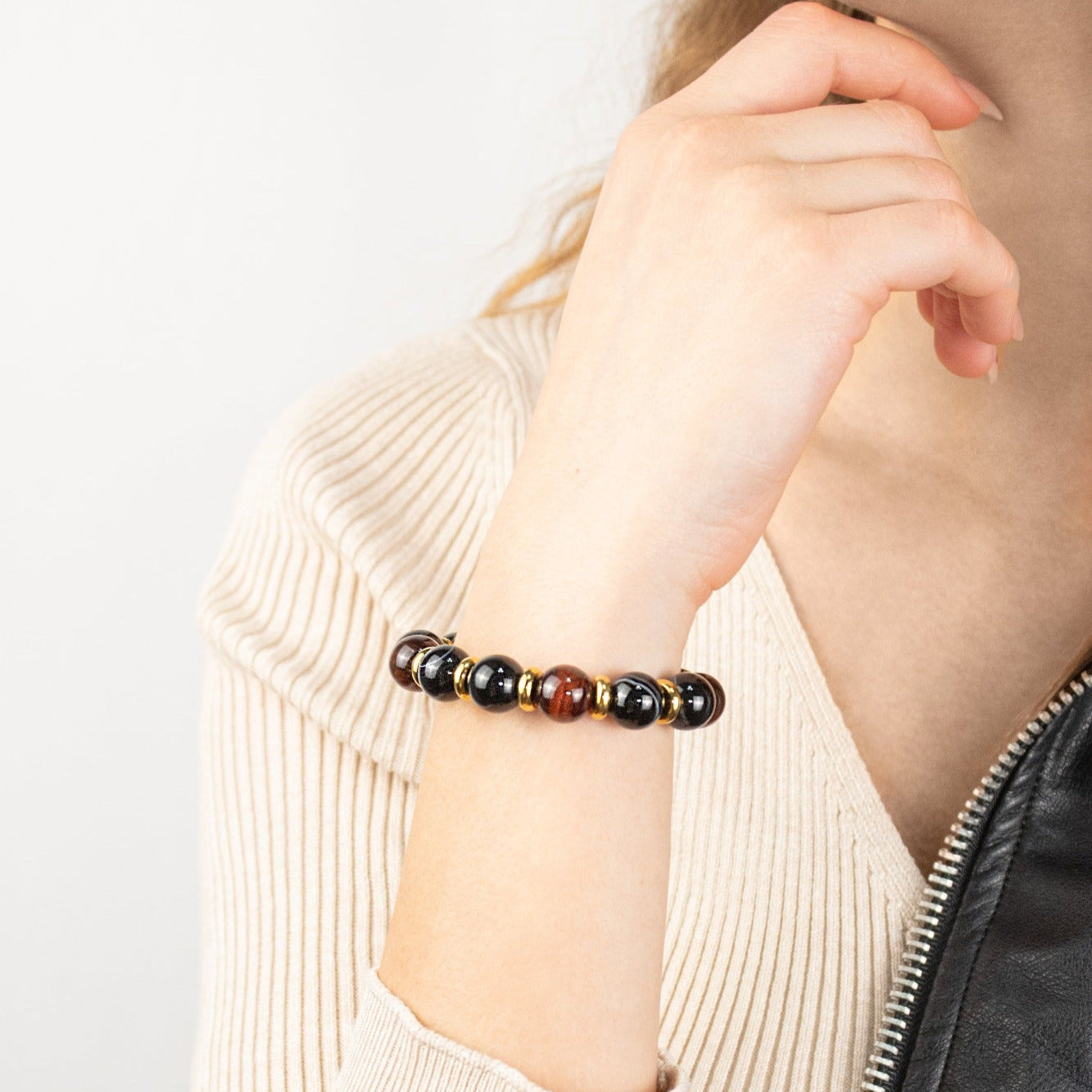 Stylish Red Tiger Eye and Agate Eye bracelet worn with casual attire. Stylish Red Tiger Eye and Agate Eye bracelet worn with casual attire.