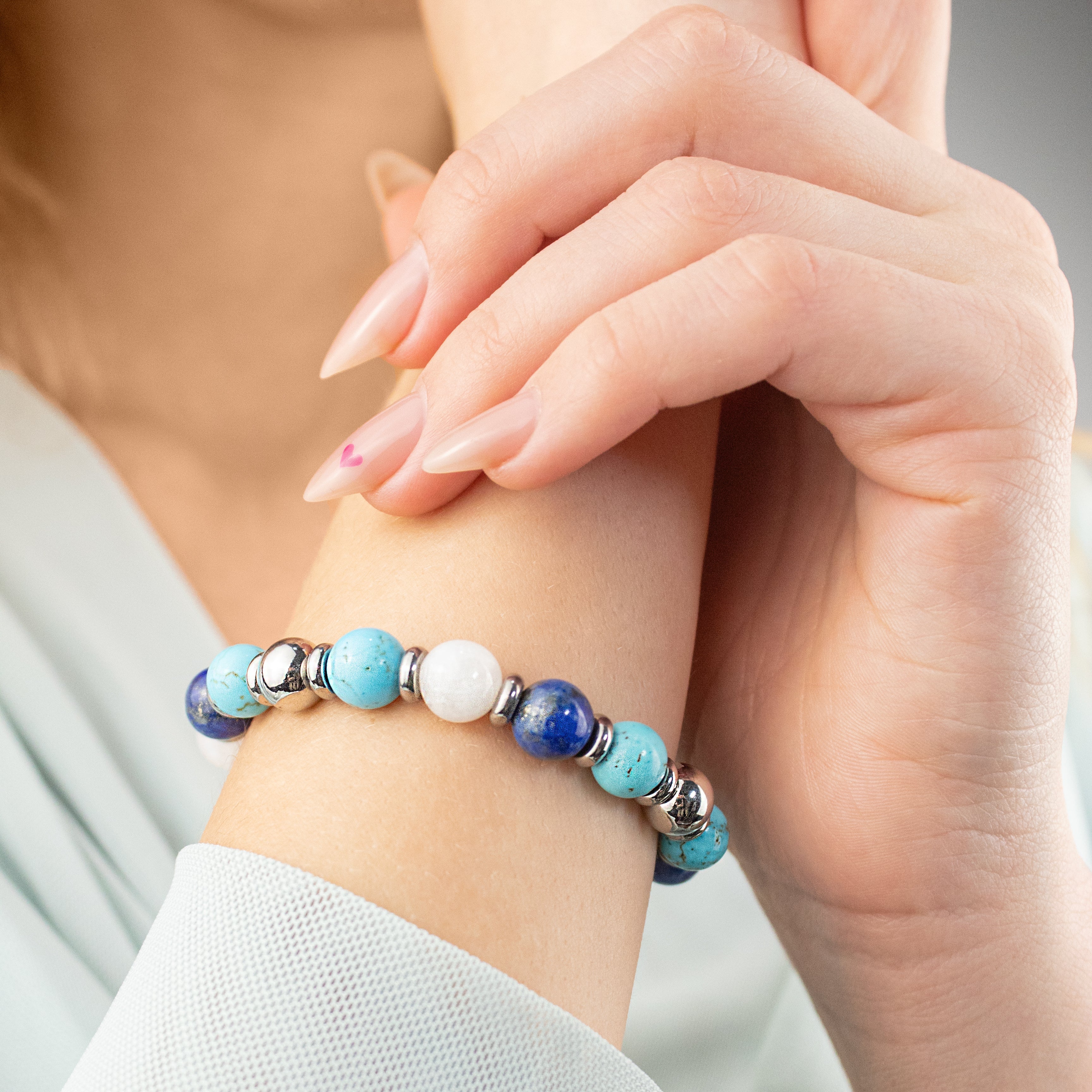 Elegant women's bracelet featuring Belomorite, Lapis Lazuli, and Turquoise – side angle. Elegant women's bracelet featuring Belomorite, Lapis Lazuli, and Turquoise – side angle.