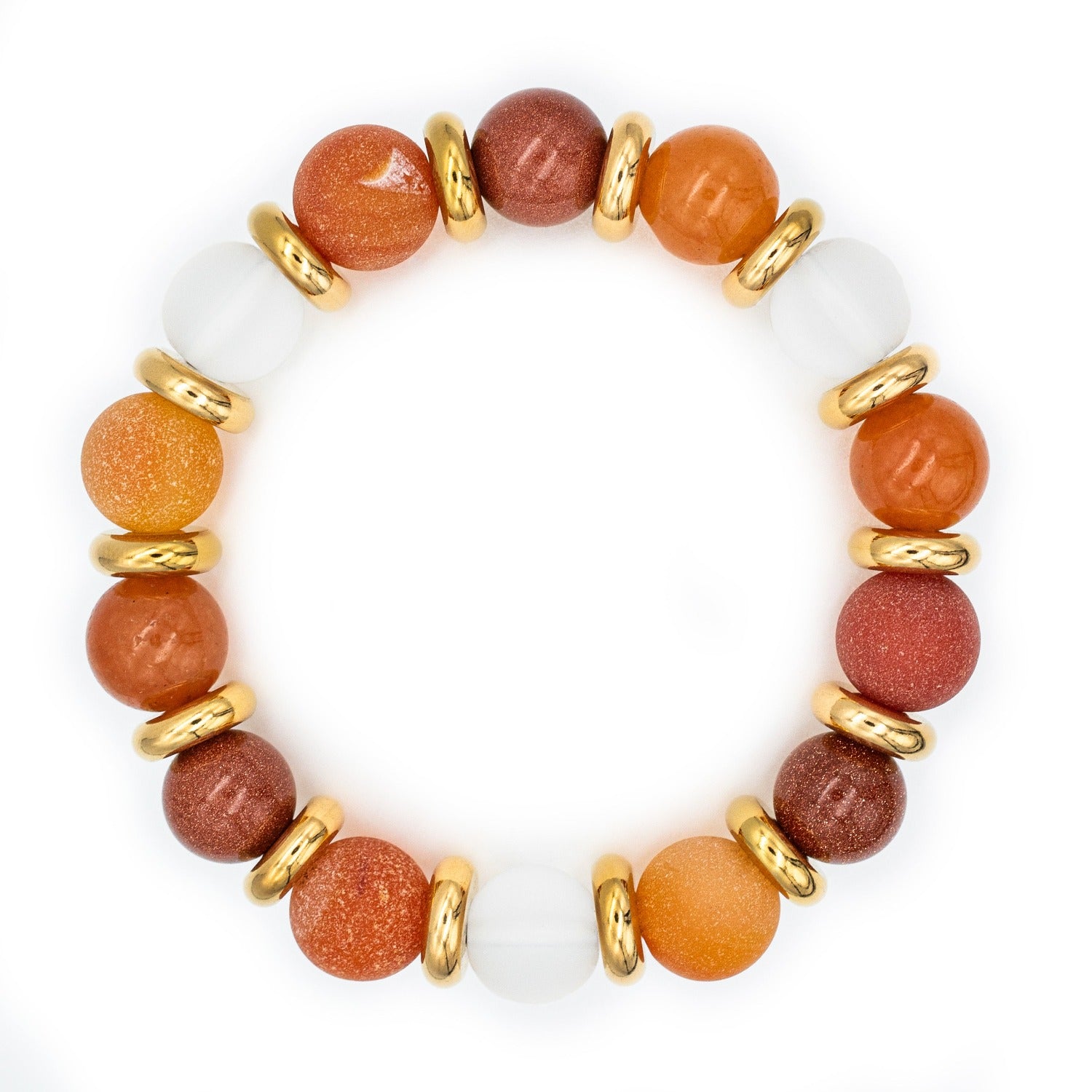 Close-up of Agate and Aventurine bracelet featuring natural gemstones and gold-plated details. Close-up of Agate and Aventurine bracelet featuring natural gemstones and gold-plated details.