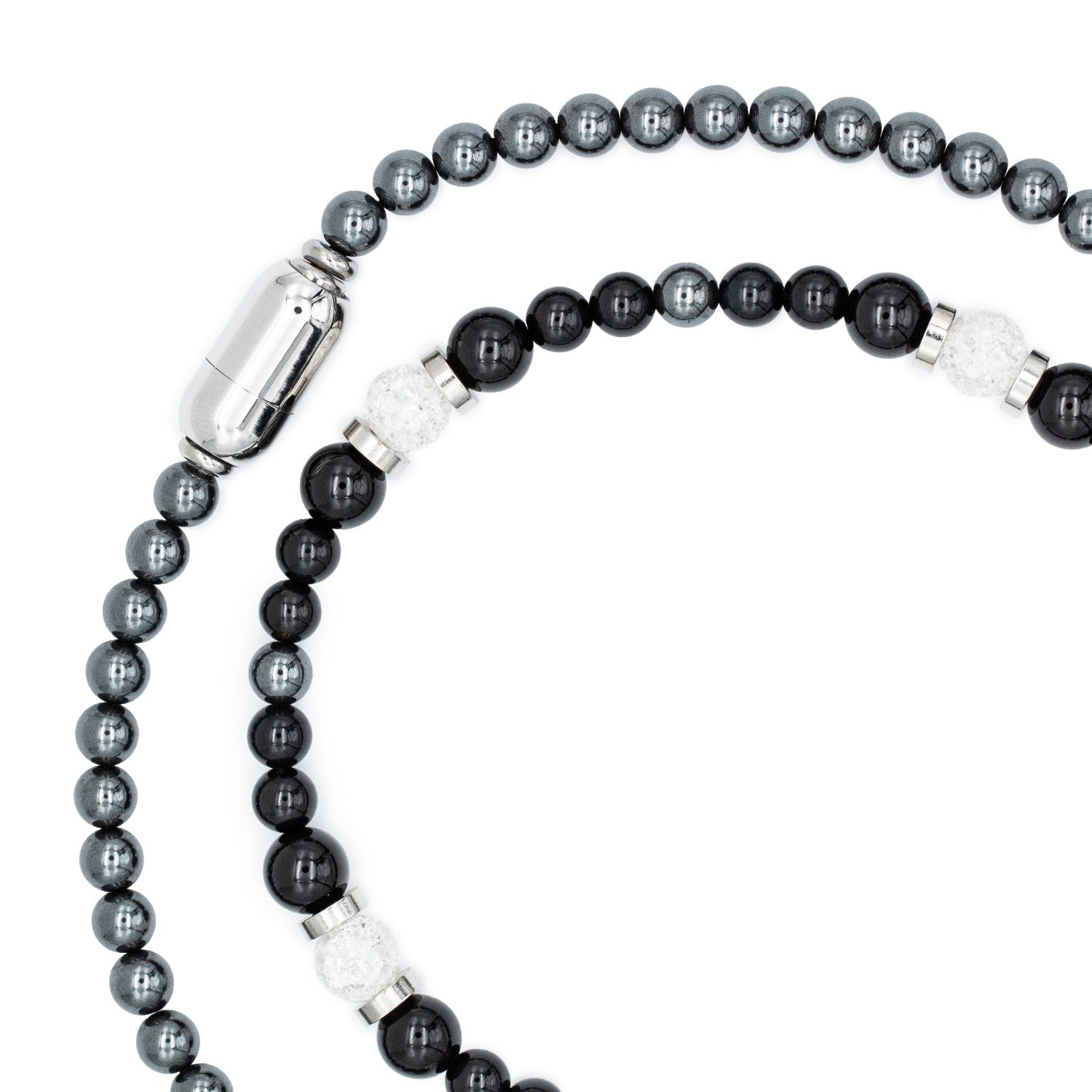 Elegant men’s necklace featuring Black Tourmaline, Onyx, Hematite, and Clear Quartz, displayed on a white background, designed for professional excellence and ambition. Elegant men’s necklace featuring Black Tourmaline, Onyx, Hematite, and Clear Quartz, displayed on a white background, designed for professional excellence and ambition.
