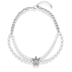 Close-up of butterfly pendant with CZ on pearl necklace