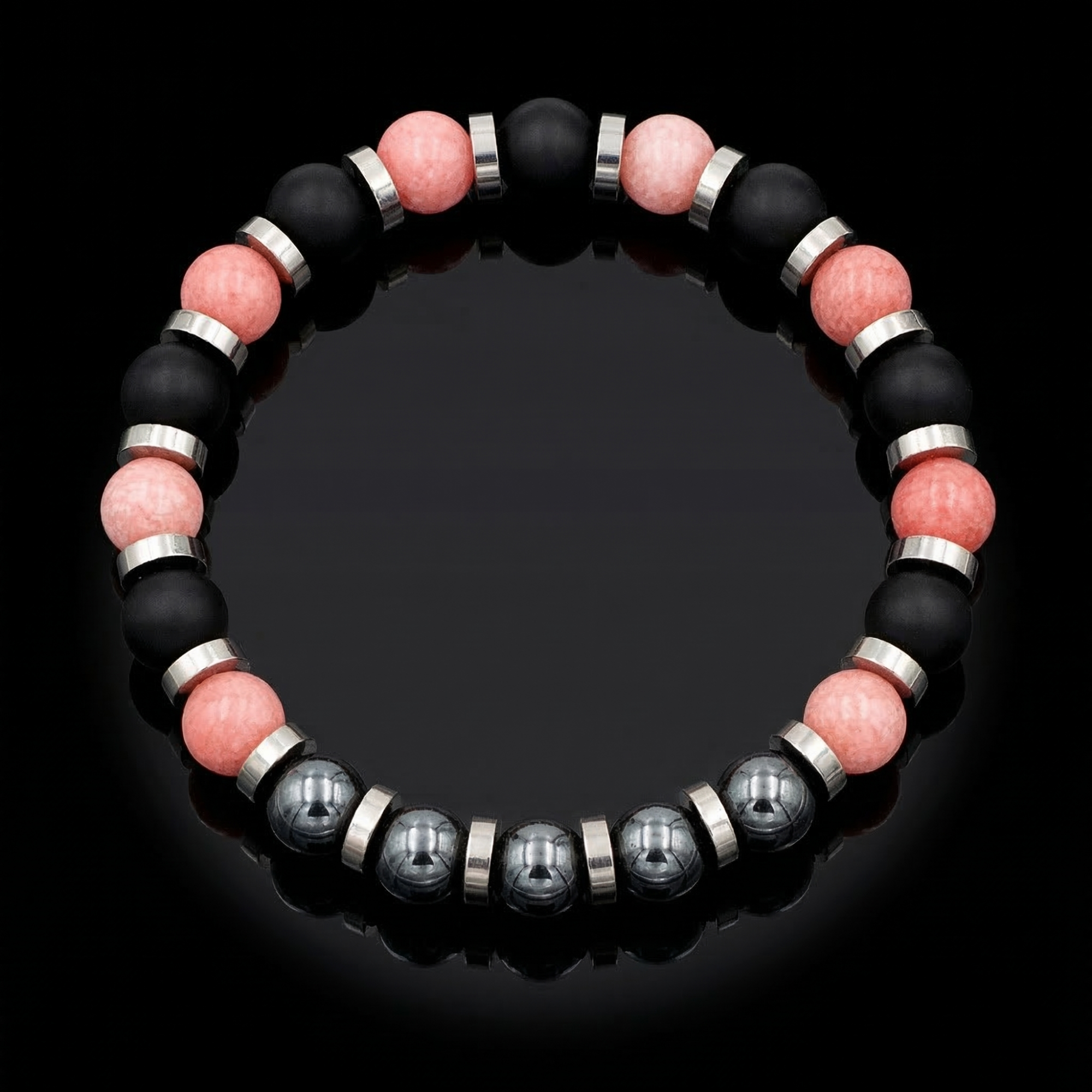 Handcrafted men’s bracelet with Onyx, Chalcedony, and Hematite beads on white background, designed for strength and balance.