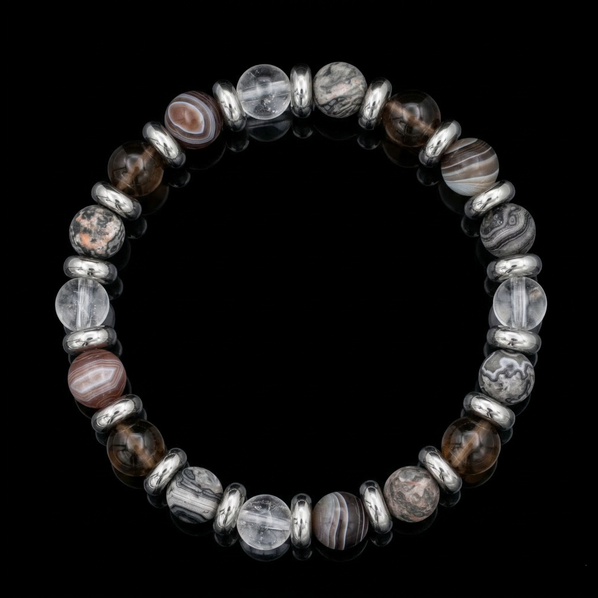 Handcrafted men’s bracelet with Howlite, Hematite, and Clear Quartz beads, designed for focus and inspiration.