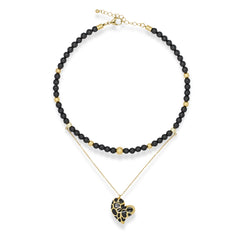 Women's beaded choker necklace with onyx, black tourmaline, gold chain, and heart pendant