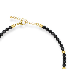 Onyx and black tourmaline choker necklace with gold heart pendant and clasp details