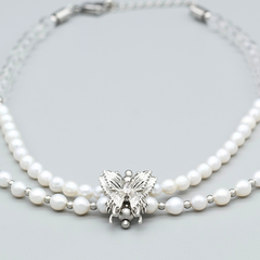 Handmade pearl necklace with clear quartz beads and butterfly charm