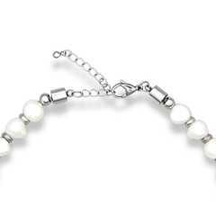 Close-up of handcrafted pearl choker with steel 