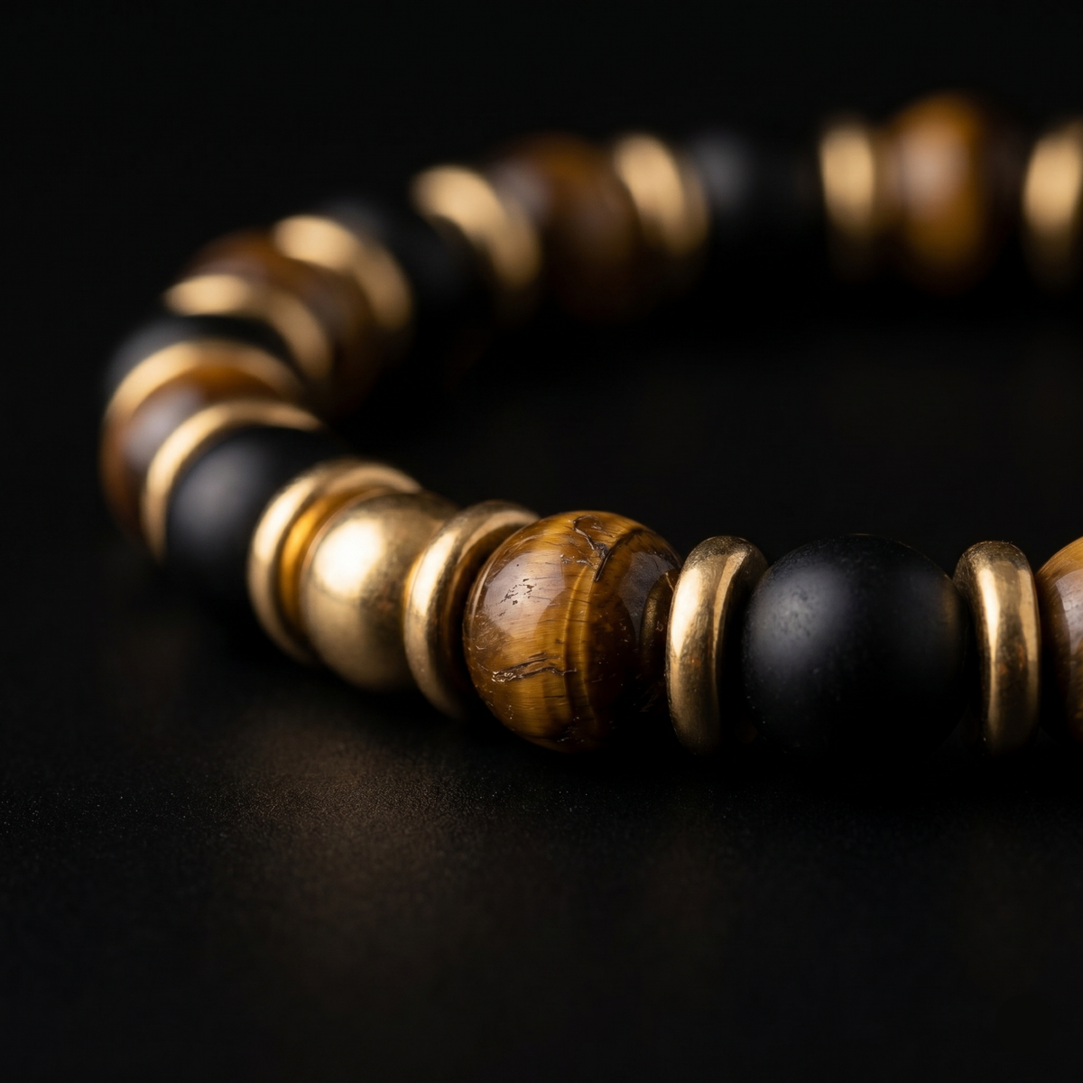 Macro detail of natural stone beads and gold accents showing organic texture and natural variations